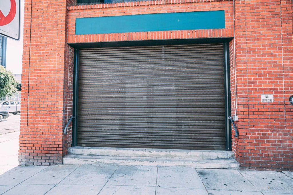 Commercial security door installed for brick building