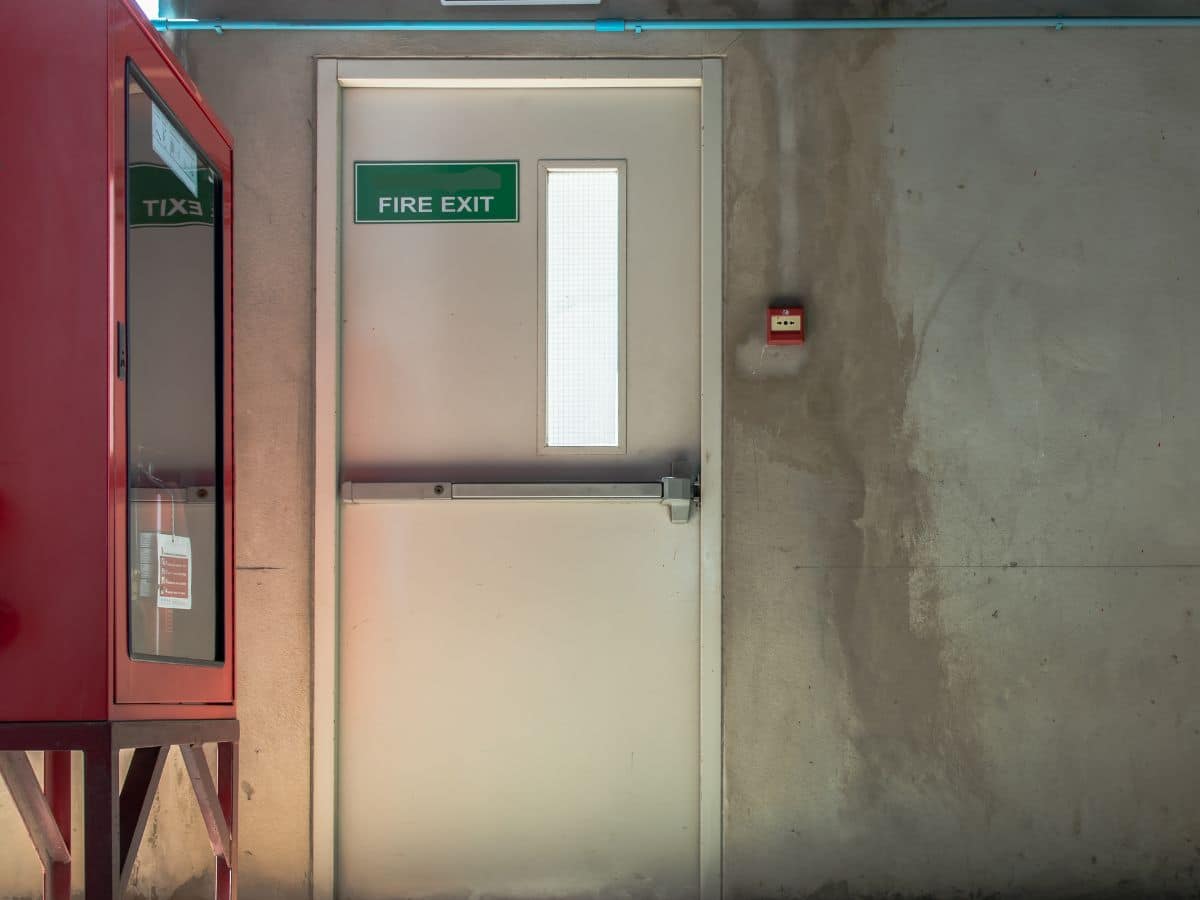Door with a green fire exit sign