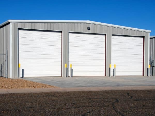 three commercial garage doors